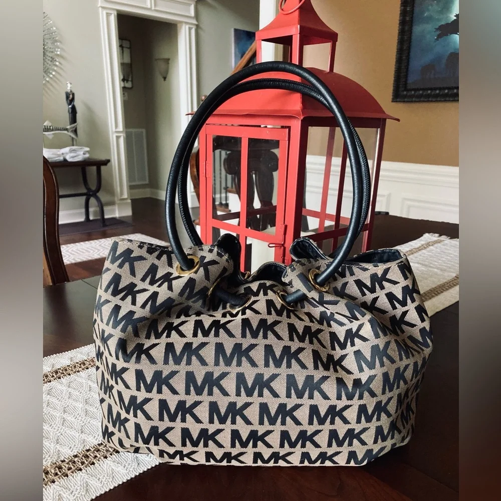 Michael Kors Coated Canvas Bucket Drawstring Bag. - Picture 7 of 9